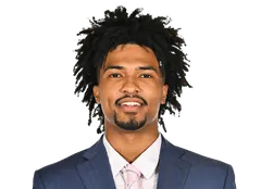 Miles Brewster headshot